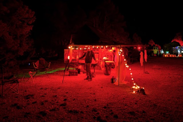 Camp glowing red at night