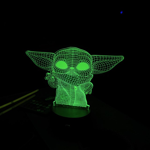 Glowing green lamp in the dark